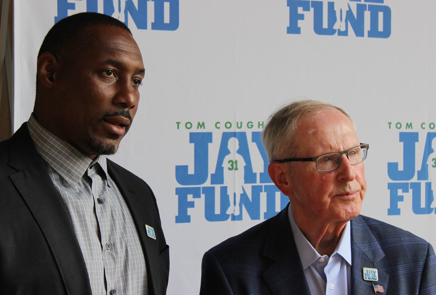 Coach Tom Coughlin, right, poses for a photo next to Jacksonville Jaguars Director of Player Development Marcus Pollard.